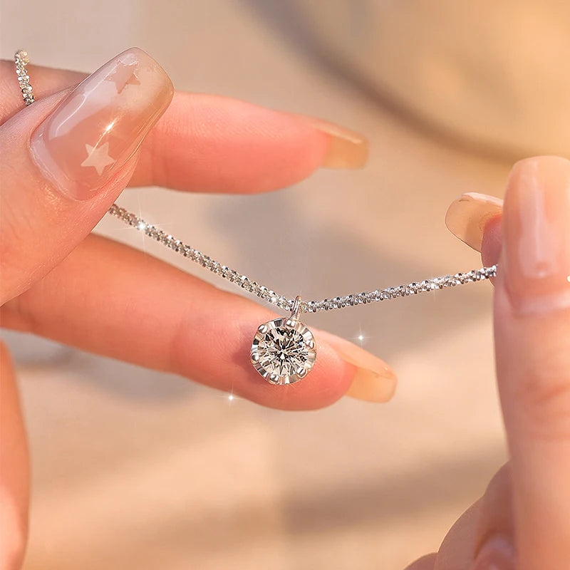 The Glint Pendant | A Moissanite Solitaire Necklace in Sterling Silver