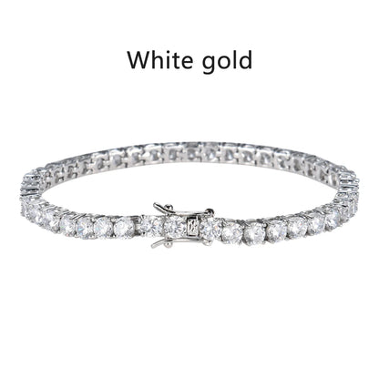 The Solara Bangle | Tennis Design Moissanite Bracelet shines with pear-cut moissanite on a sleek white gold band.